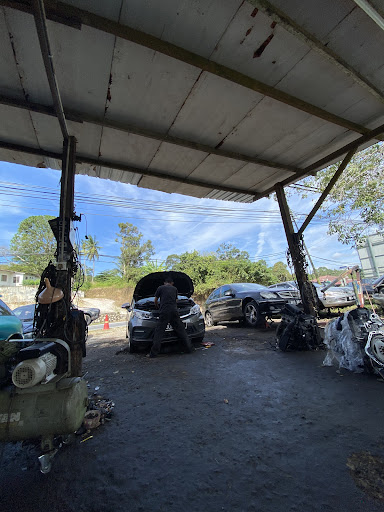 Along Auto Garage